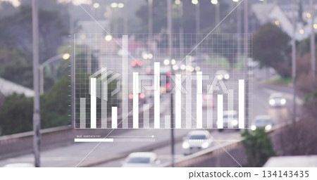 Displaying translucent bar chart overlay from elevated highway with cars, barriers and streetlights 134143435
