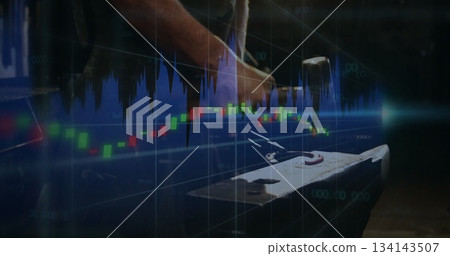 Hammering leather-aproned blacksmith forging glowing rod on anvil in forge with financial overlays 134143507