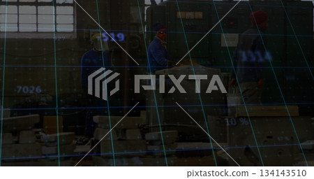 Operating lathe operator adjusting panel with colleague walking past workshop, digital grid overlay 134143510