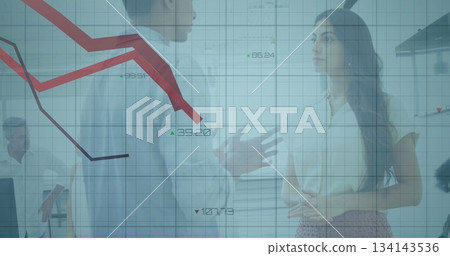 Discussing woman and man sharing financial insights in office meeting with glass partition overlay 134143536