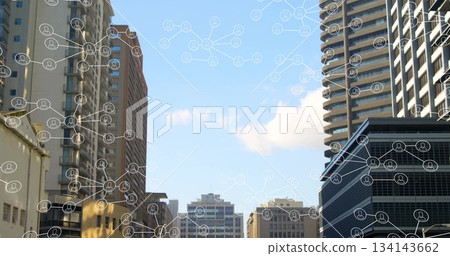 Displaying midrise buildings with network overlay in downtown street, with nodes and user icons 134143662