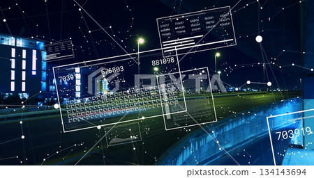 Displaying translucent HUD panels, network nodes hovering above highway at night with city lights Displaying translucent HUD panels, network nodes hovering above highway at night with city lights 134143694
