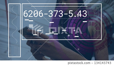 Holding smartphone businesswoman using AR interface in corporate lobby, data visualization 134143743