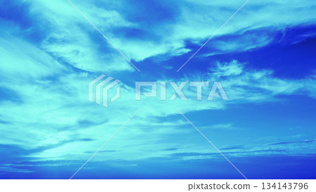 Blue cloudy sky at sunset. Sky texture. Abstract nature background Blue cloudy sky at sunset. Sky texture. Abstract nature background 134143796
