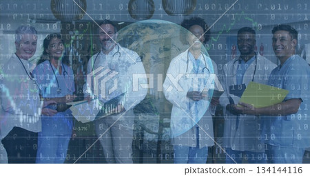 Standing medical team wearing uniforms in meeting room, with clipboards, tablet and stethoscopes Standing medical team wearing uniforms in meeting room, with clipboards, tablet and stethoscopes 134144116