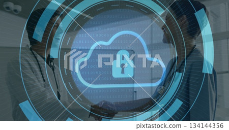 Doctors wearing lab coats, stethoscopes shaking hands in clinic hallway, hud binary cloud padlock Doctors wearing lab coats, stethoscopes shaking hands in clinic hallway, hud binary cloud padlock 134144356