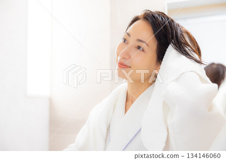 Woman in bathrobe Woman in bathrobe 134146060