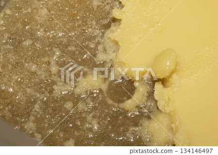 Rendered animal fat tallow lard melting chicken close up 134146497
