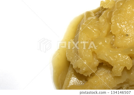 Rendered animal fat tallow lard melting chicken close up 134146507