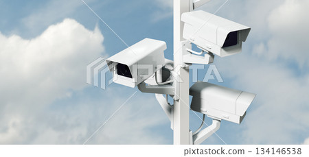 Street surveillance, security cameras on pole, total control concept background 134146538