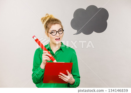 Business woman intensive thinking and writing Business woman intensive thinking and writing 134146839