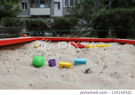Sandbox with various outdoor toys. Sandbox for children's games. Summer concept. 134148582