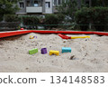 Sandbox with various outdoor toys. Sandbox for children's games. Summer concept. 134148583