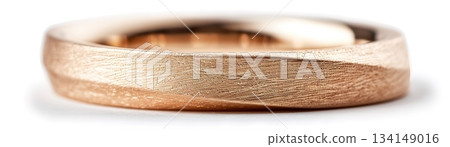 A beautifully crafted brushed gold band features a simple design with a subtle texture. Its sleek appearance makes it a perfect choice for both everyday wear and special occasions 134149016