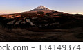 Panoramic photo of Mount Echizen in the Aitaka mountain range taken from the Torigoki Plateau Observatory. Mount Fuji bathed in the morning sun. 134149374