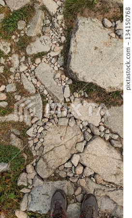Hiking boots on rocky path in high tatras mountains, slovakia 134150768