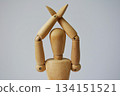A drawing doll making a cross by hand 134151521