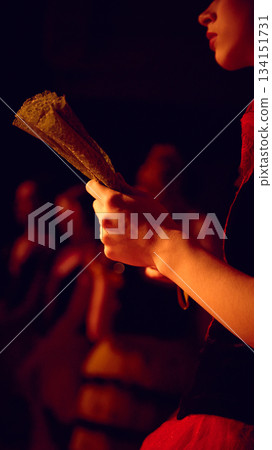 Close-up of dancer holding lace fan in backstage preparation zone 134151731