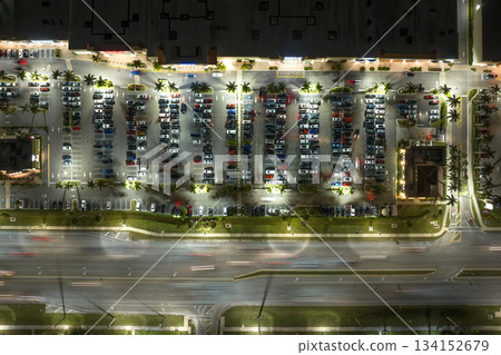 Wide highway with shopping malls and small businesses in North Port, Florida after sunset. USA transportation and retail infrastructure concept Wide highway with shopping malls and small businesses in North Port, Florida after sunset. USA transportation and retail infrastructure concept 134152679
