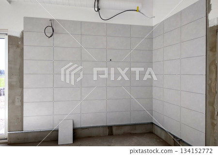 Wall ceramic tiles installation on mortar glue. Wall ceramic tiles installation on mortar glue. 134152772