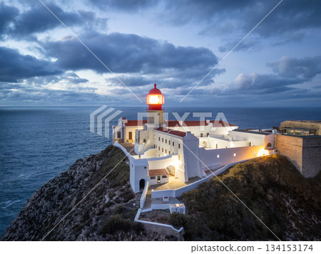 Cape Sao Vicente, Lighthouse and Atlantic Ocean in Evening Twilight. Aerial View. Algarve, Portugal 134153174