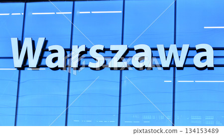 Warsaw, Poland. 28 November 2025. Neon sign on the glass front: Warszawa Warsaw, Poland. 28 November 2025. Neon sign on the glass front: Warszawa 134153489