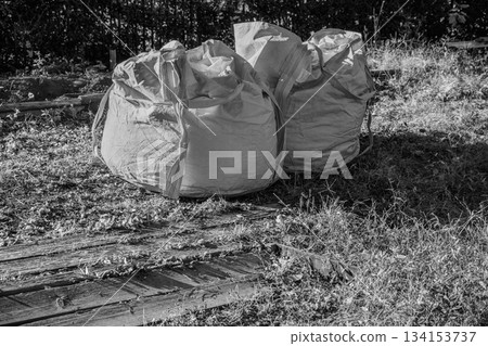 Monochrome flexible container bag at construction site Monochrome flexible container bag at construction site 134153737