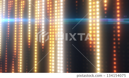 Glowing vertical rows of warm LED lights with golden and orange tones forming a vibrant illuminated abstract backdrop 134154075