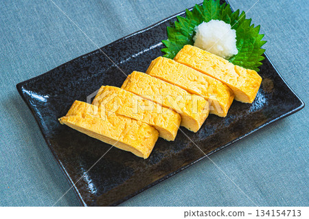 Rolled omelet, a classic Japanese dish Rolled omelet, a classic Japanese dish 134154713