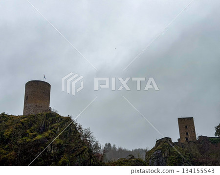 Esch-Sur-Sure, Wiltz, Grand Duche De Luxembourg, December 7, 2025, Rainsoaked hills and dramatic 134155543