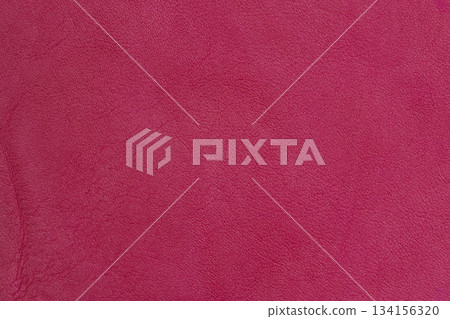 Textured leather surface in bold Lava red color with fine natural grain and vibrant tone. Natural background for fashion design, trend focused palettes and statement styling Textured leather surface in bold Lava red color with fine natural grain and vibrant tone. Natural background for fashion design, trend focused palettes and statement styling 134156320