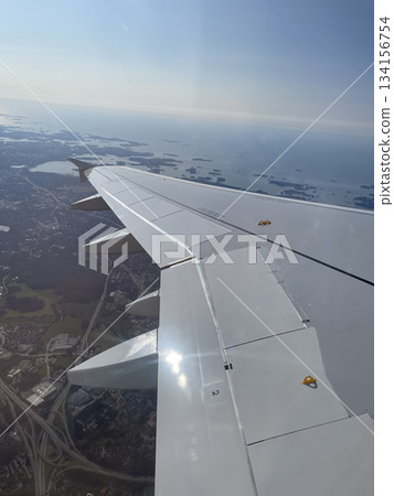 A comfortable flight from Helsinki to Milan 134156754