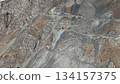 Aerial view of rocky terrain with mining roads and mineral deposits 134157375