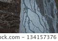 Aerial view of glacial river patterns on rocky terrain with textures 134157376