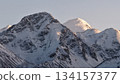 Majestic snow-covered mountains under soft morning light 134157377