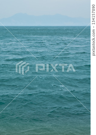 Sea view at sunset on nature concept. Beautiful sea and sky. For background, creative design graphic wallpaper. Sea view at sunset on nature concept. Beautiful sea and sky. For background, creative design graphic wallpaper. 134157890