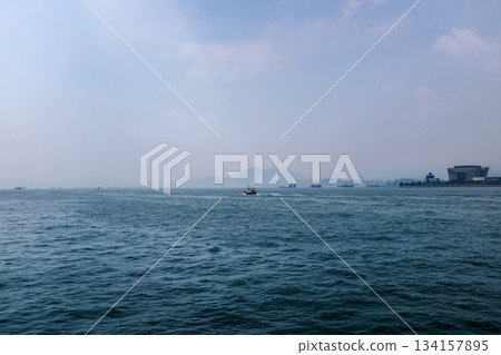 Sea view at sunset on nature concept. Beautiful sea and sky. For background, creative design graphic wallpaper. Sea view at sunset on nature concept. Beautiful sea and sky. For background, creative design graphic wallpaper. 134157895