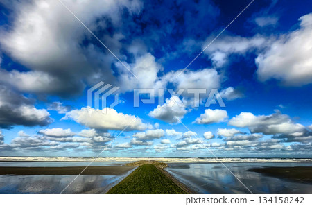 Nieuwpoort, West-Vlaanderen, Belgium, Ocotber 25th, 2025, Expansive rural lakes reflect clear blue Nieuwpoort, West-Vlaanderen, Belgium, Ocotber 25th, 2025, Expansive rural lakes reflect clear blue 134158242