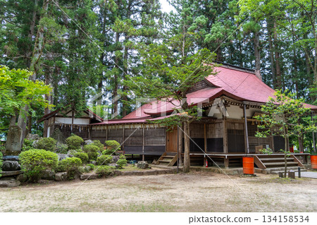Shinmei Shrine surrounded by forest trees in Takayama, Japan 134158534