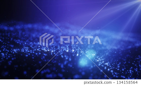 Abstract blue glowing energy waves from particles and magical dots with blur effect on dark background. Abstract background Abstract blue glowing energy waves from particles and magical dots with blur effect on dark background. Abstract background 134158564