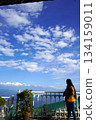 Young Woman Looks Out at Himalayas and Kanchenjunga Peaks 134159011