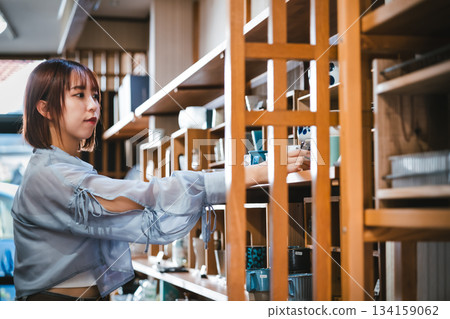 Choosing items at a general store 134159062