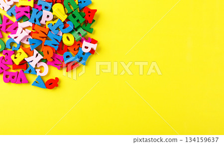 colored letters of the alphabet on a yellow background colored letters of the alphabet on a yellow background 134159637