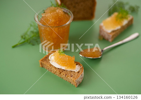 Gourmet golden caviar appetizer presented with fresh dill and rustic bread Gourmet golden caviar appetizer presented with fresh dill and rustic bread 134160126