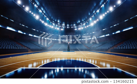 Empty basketball arena with bright lights and court in evening setting for an upcoming game 134160215