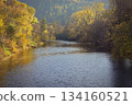 Autumn landscape with river and setting sun. Concept for nature and autumn time 134160521