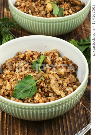 Traditional buckwheat porridge with chicken meat. Traditional buckwheat porridge with chicken meat. 134162502