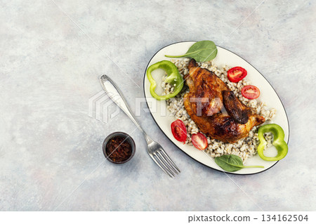 Half grilled chicken on the grill, menu. Half grilled chicken on the grill, menu. 134162504