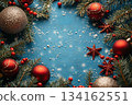 Blue background with red and gold Christmas ornaments. Copy space 134162551