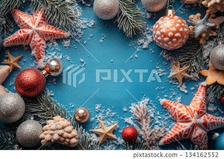 Blue background with red and gold Christmas ornaments. Copy space Blue background with red and gold Christmas ornaments. Copy space 134162552